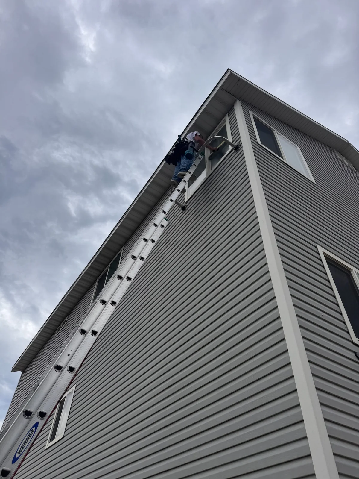 High ladder access at a residential gutter