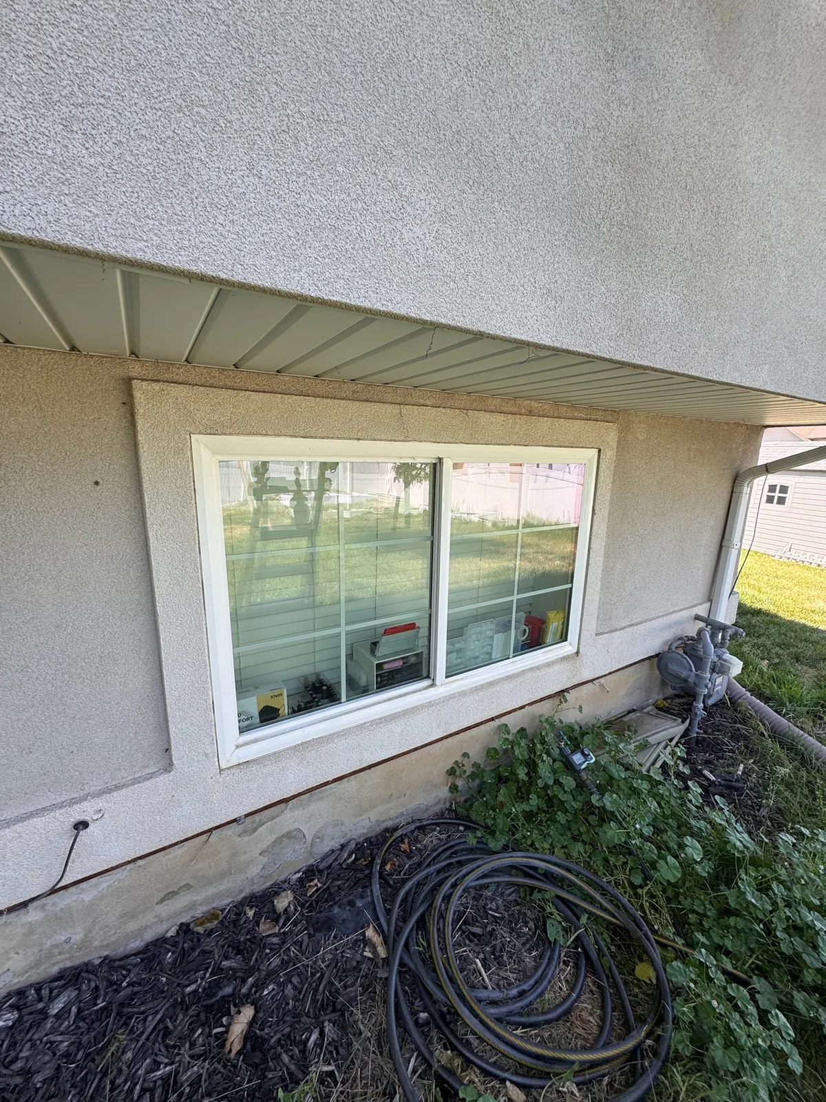 Residential window before cleaning