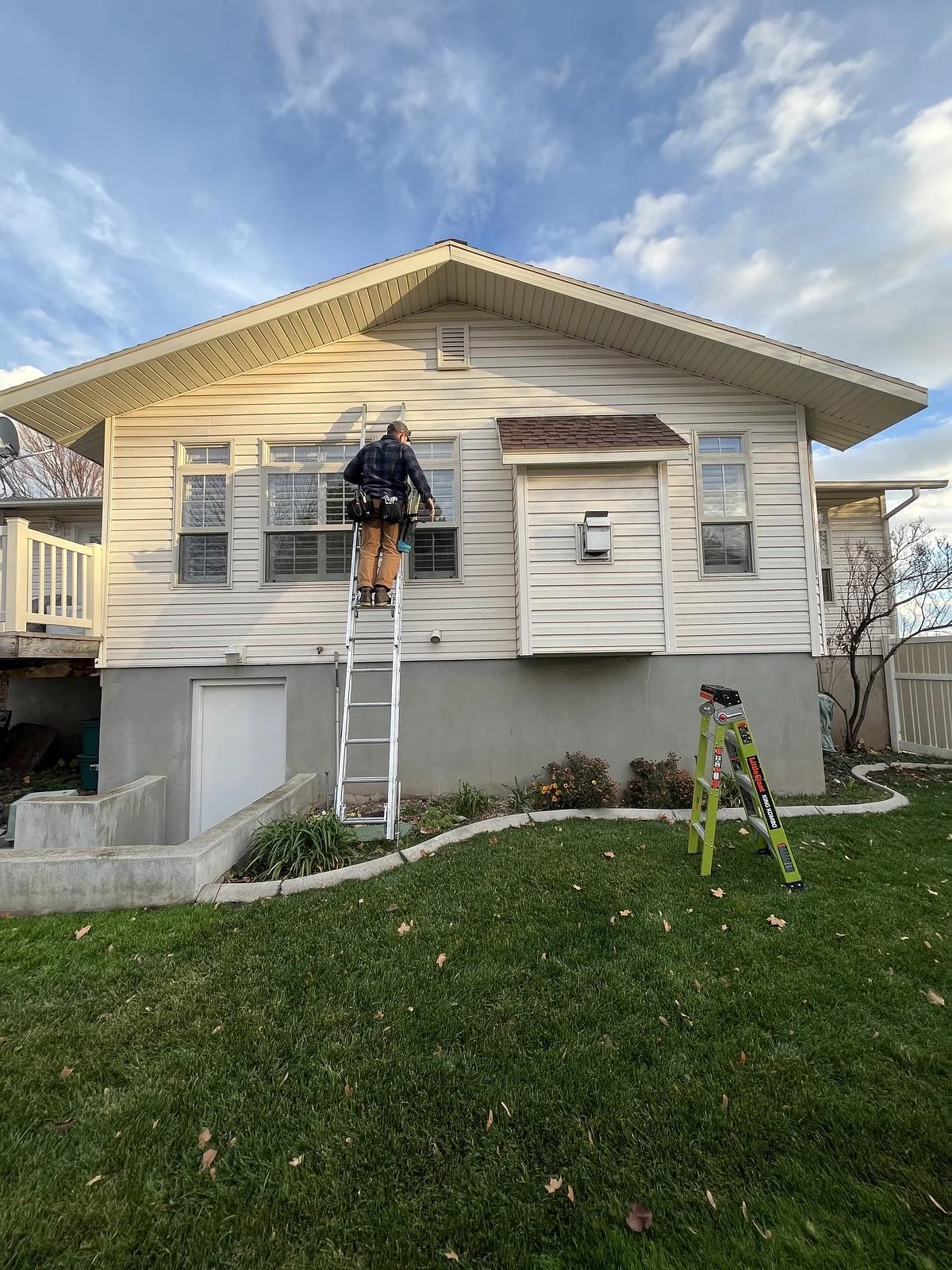 Extension-ladder window cleaning