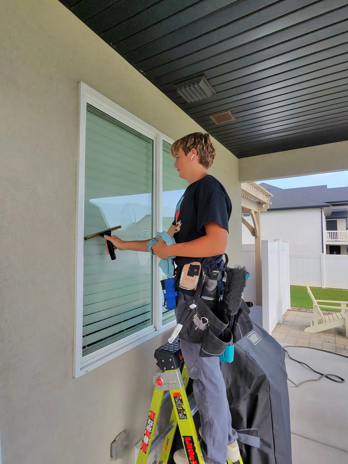 Residential window cleaning with a squeegee